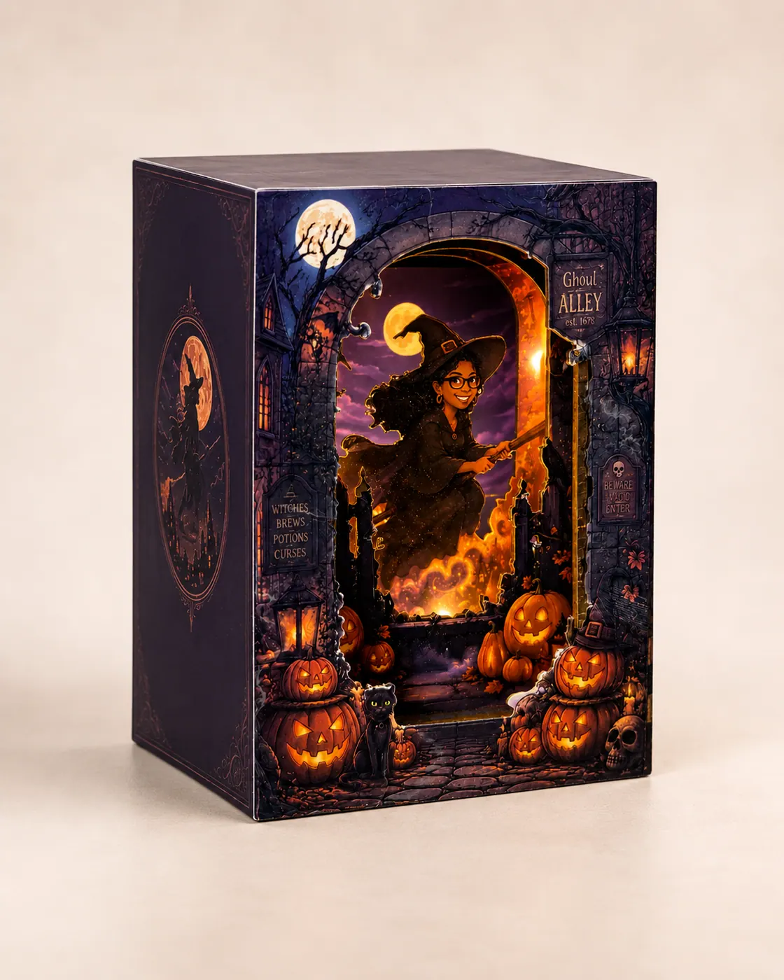A finished mini book nook of a witch flying through a glowing Halloween alley